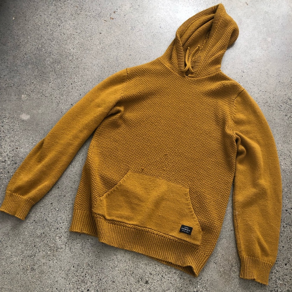 Unique yellow colored knitted hoodie.